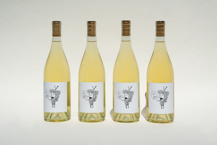 The Got Grapes 4-Pack from Broc Cellars, featuring corked bottles with a black and white label of a figure holding organically grown grapes, are aligned in a row against a plain background.