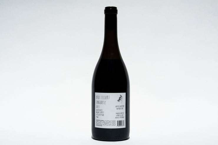 A tall, dark glass bottle of 2023 Sangiovese by Broc Cellars is centered on a white background. The label from Fox Hill Vineyard details California terroir. Its sealed cap and minimalistic design exude elegance.